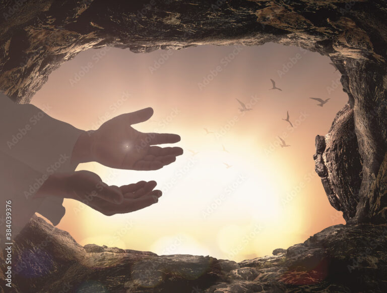 Ascension day concept: The scars In the hands of Jesus Christ over tombstone sunrise background