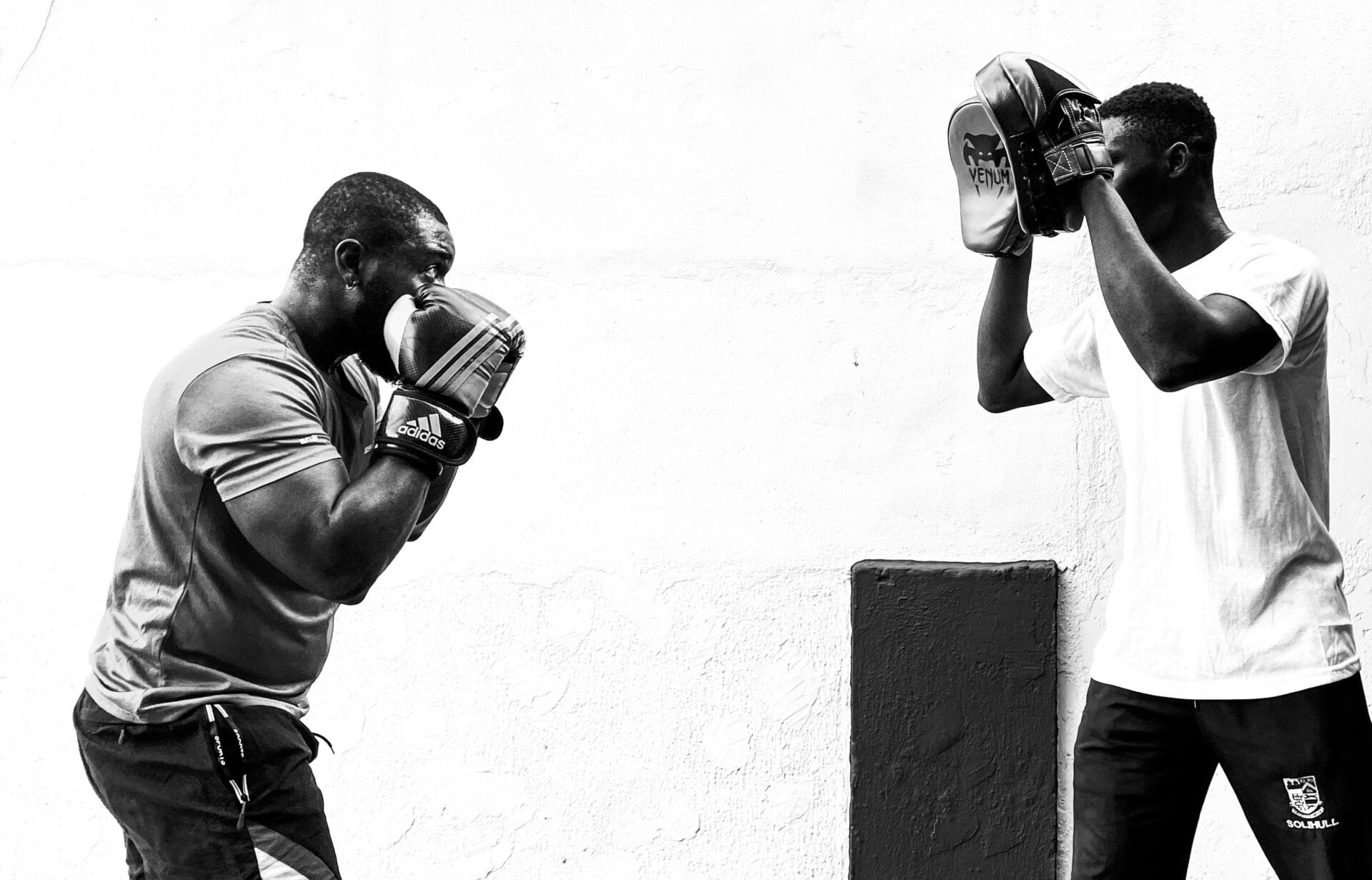 Black and white boxing training session