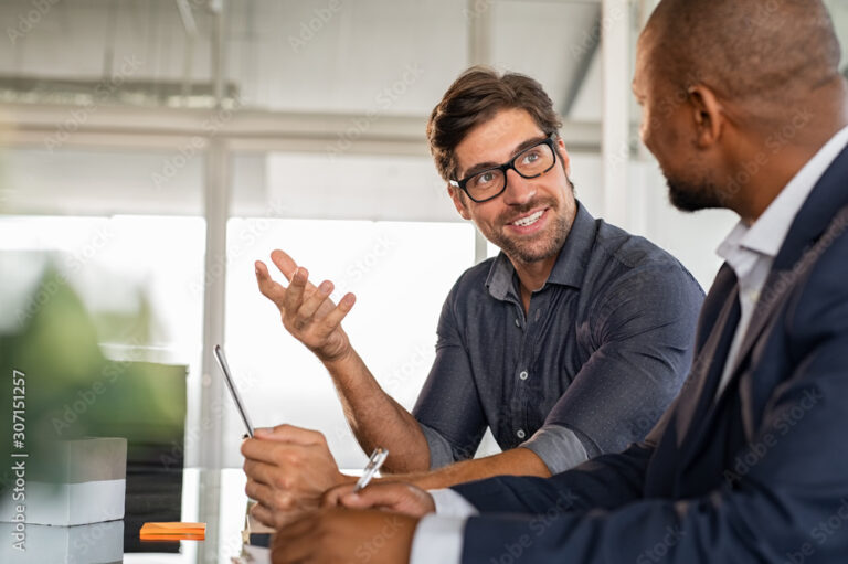 Businessman discussing project with colleague