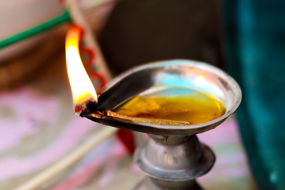 Close up of a metal oil lamp