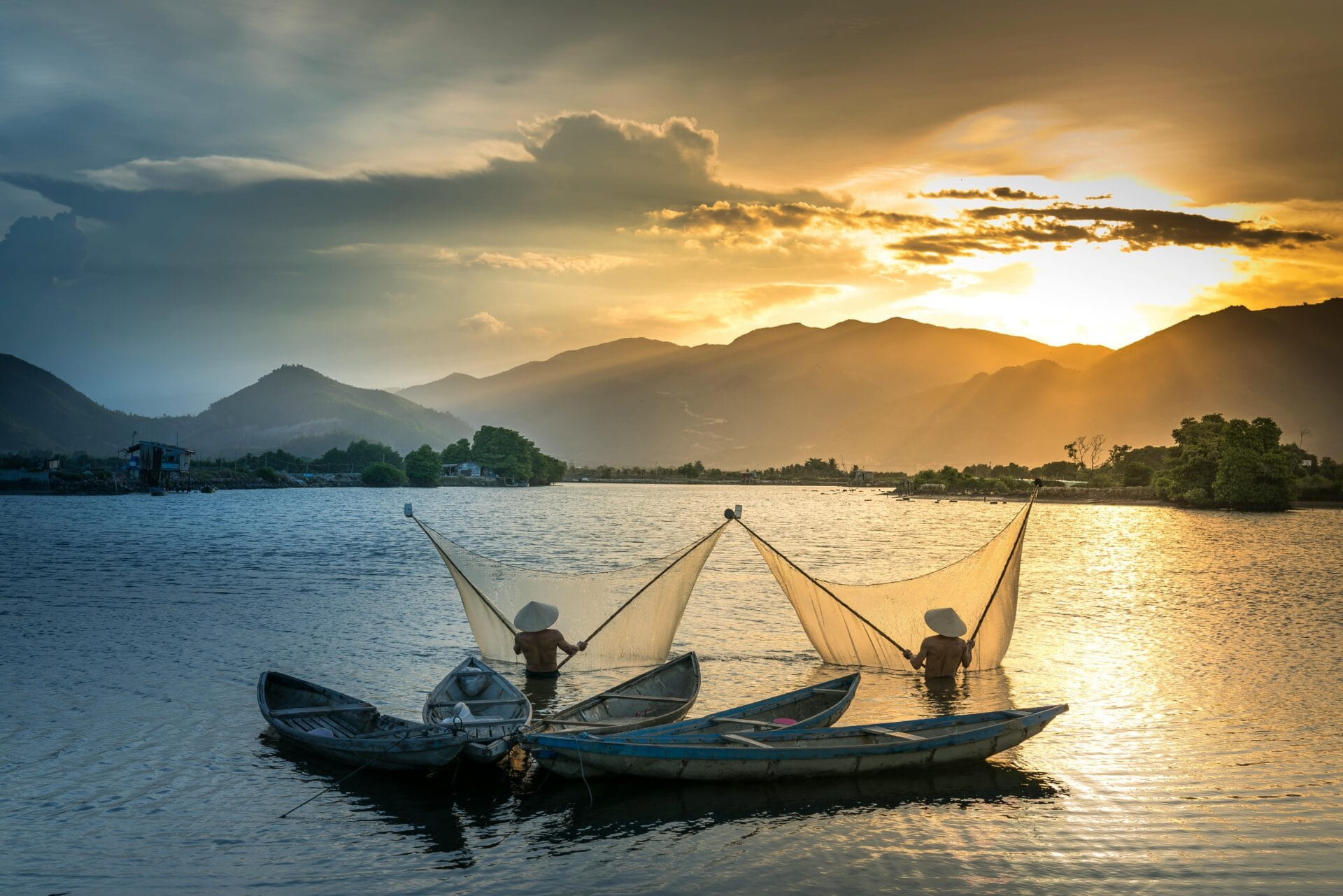 Men on water spreading nets