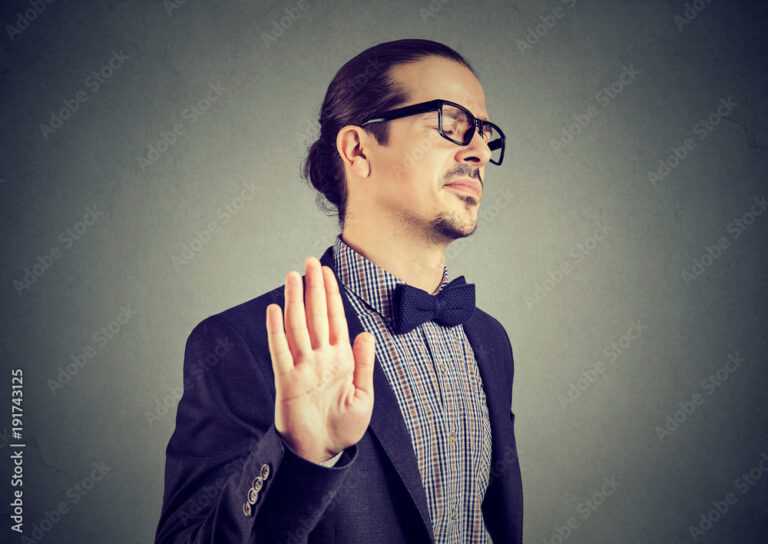 Offended man giving stopping gesture