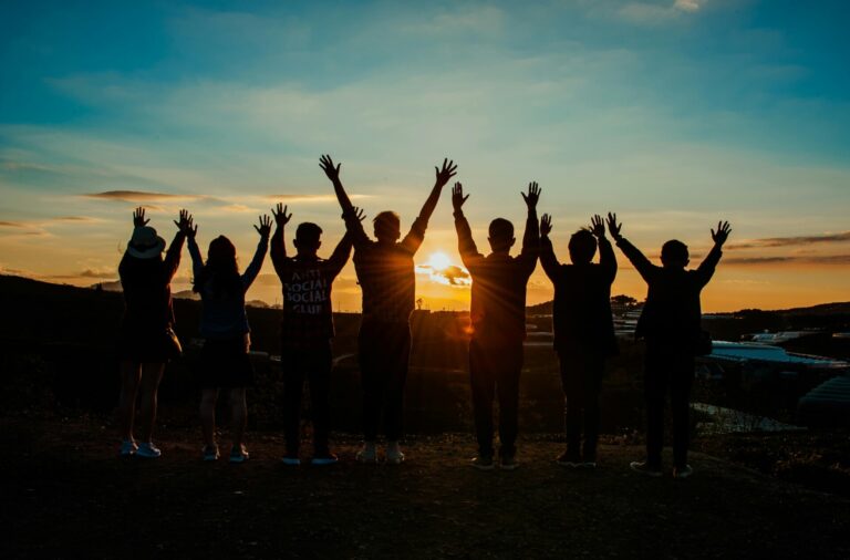 People silhouette during sunset