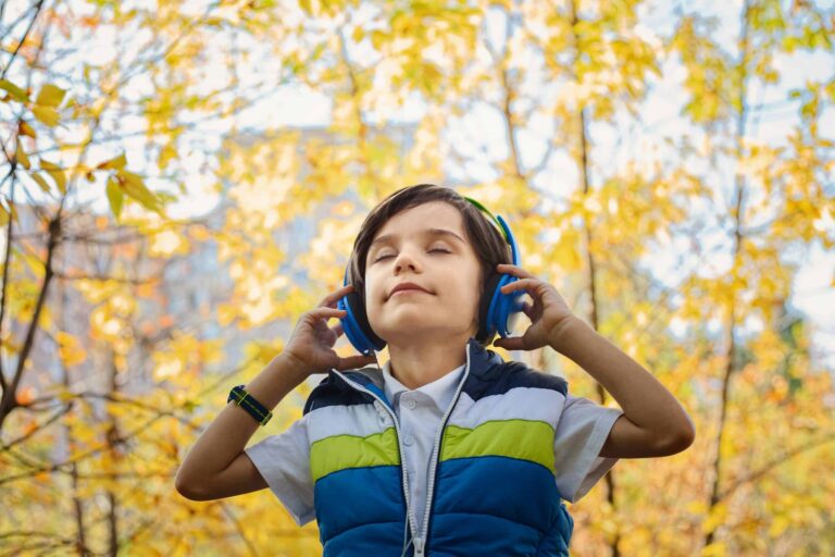 Photo of a boy listening in headphones