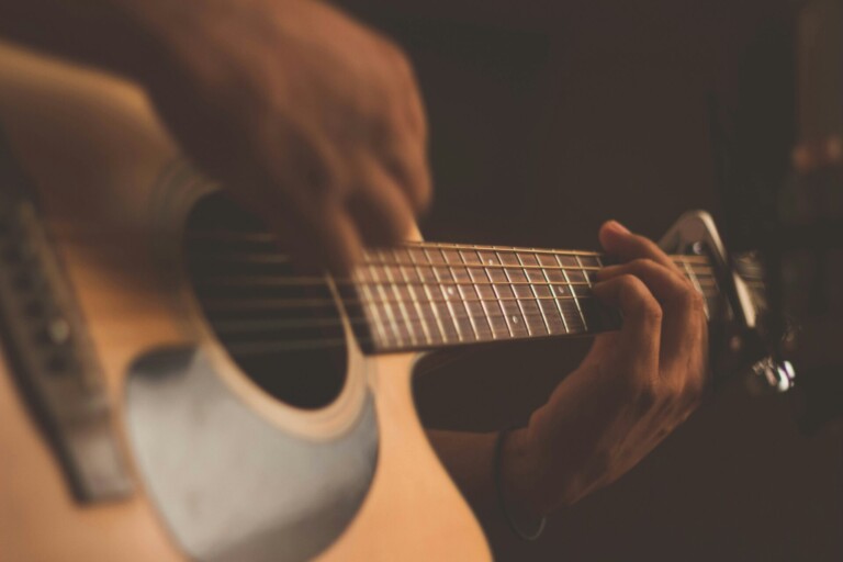 Playing guitar