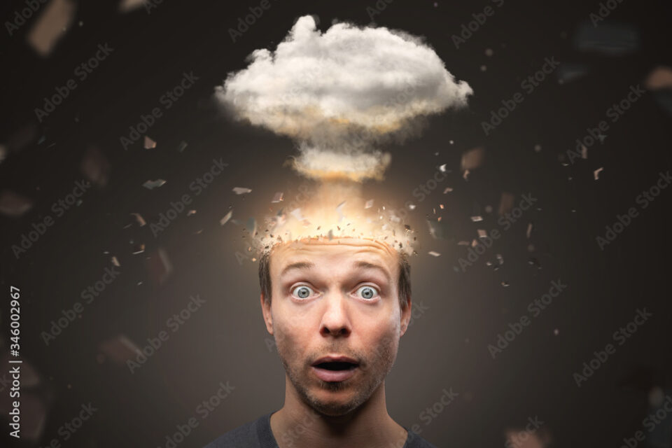 Portrait of a man with an exploding mind