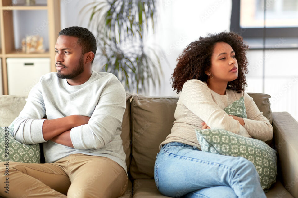 relationship difficulties, conflict and people concept - unhappy african american couple having argument at home