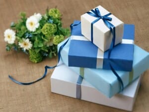 Stacked blue colored gift boxes