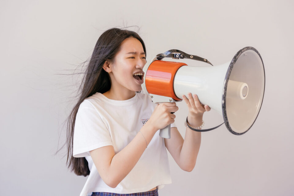 Woman using megaphone