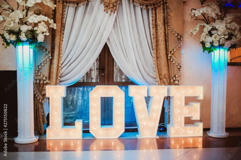 Wooden glowing love text letters. Rustic wedding dance floor lamp.