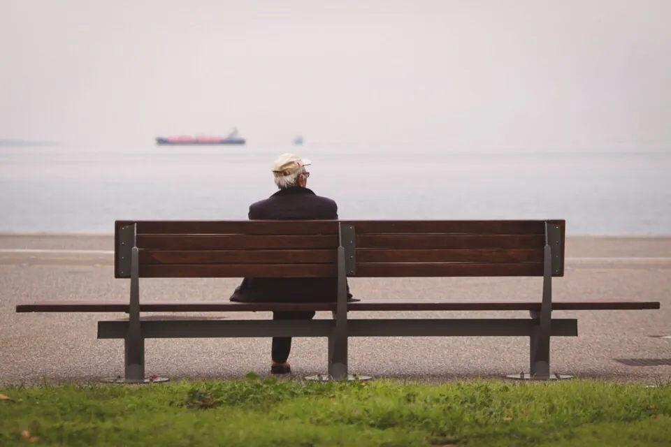 Old man sitting on a bench